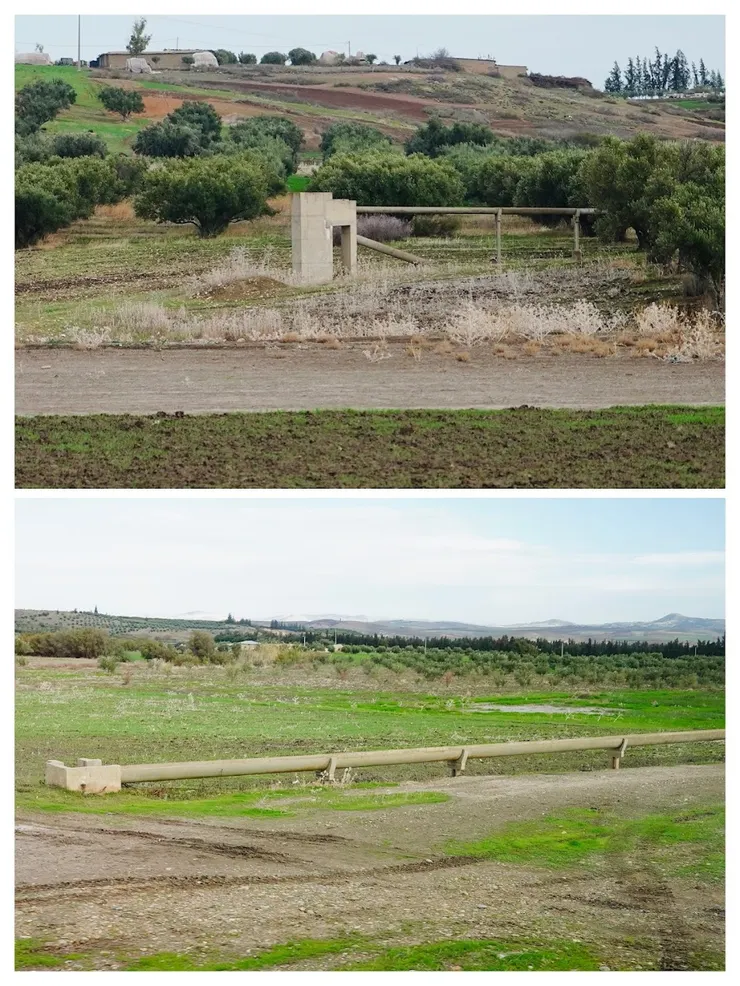 輸水管架在支架上保持坡度，讓水慢慢往低處流。