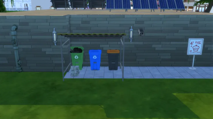 我想了很久垃圾場該設在哪裏，在門口附近太難看，但也不想員工推垃圾推得太遠會辛苦，剛好這裏有個凹位。