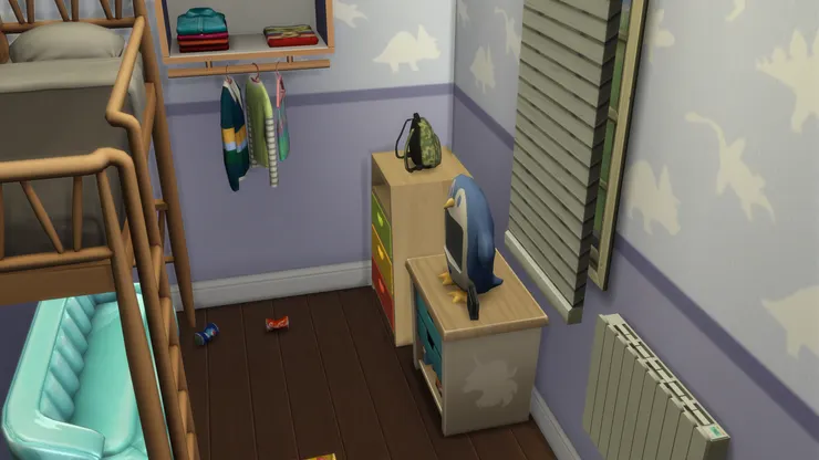 男孩的年紀比較小,所以房間佈置得童趣一點。