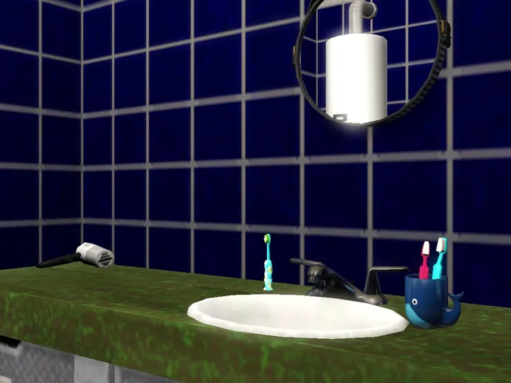 雖然洗手間有海洋的感覺,但洗理台用了綠色,造成反差。