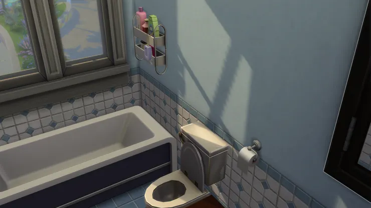 我覺得這個洗手間真是「每吋必爭」，因為空間呈長形，但要放下所有必要的東西，所以每件物品都緊貼著彼此。