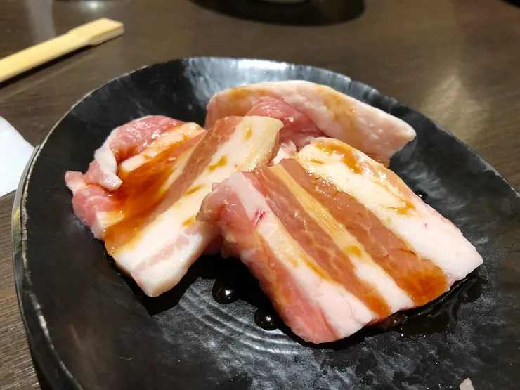 國產豬肉100土，420円。