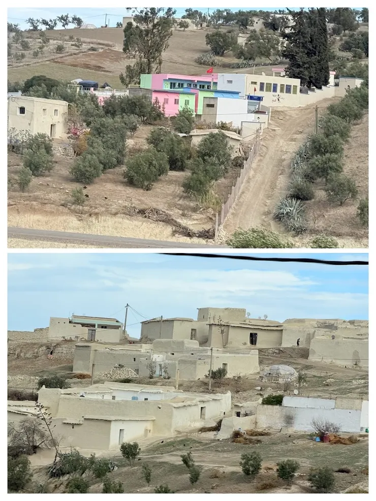 一般的房屋就是泥土房，屋頂蓋麻布。塗油漆的房子是比較高級的，看起來是公家機關。