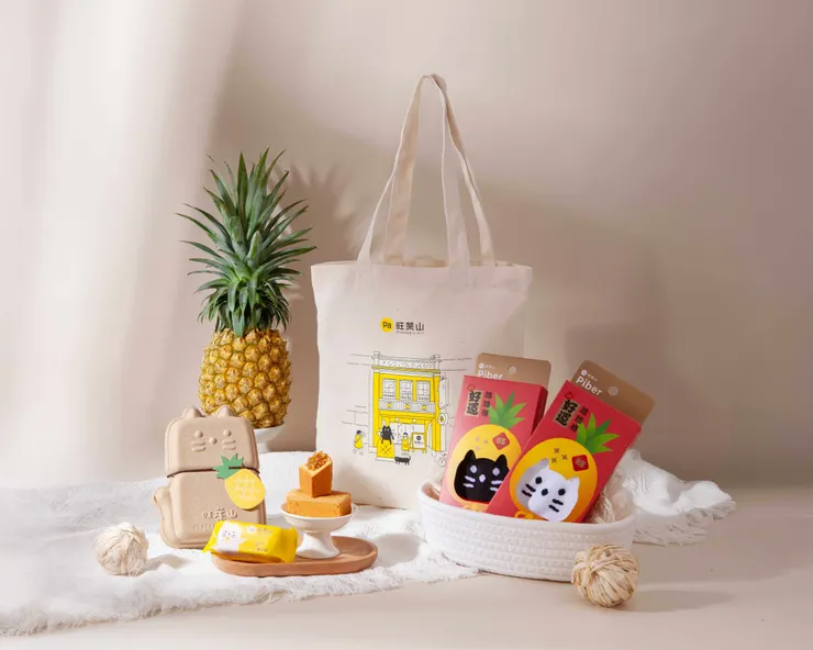 圖說：旺萊山秉持鳳梨全果應用精神、不斷探索農廢再生的可能性，從禮盒環保紙漿、再到生活服飾布包，讓永續理念真正融入日常光景。（資料來源：旺萊山）