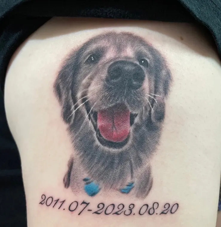 姊姊將小八刺在手臂上 以黑白顏色悼念(小八姊姊提供)