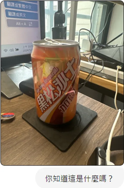 拍攝沙士的罐子