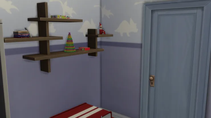 雖然這房間的聖誕飾物不多,但在一片藍色中很醒目。