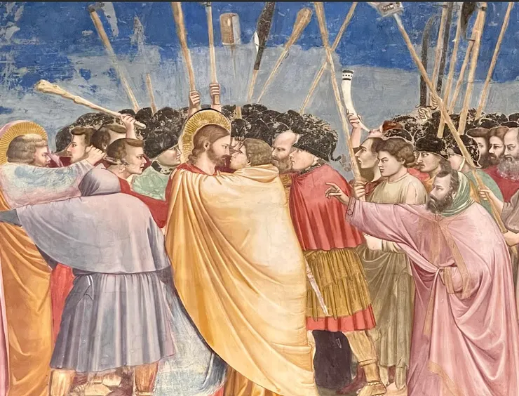 注意畫的左側，彼得在混亂中掏出一把刀，把大祭司的僕人的耳朵割下來。畫中大量人物沒有露臉而且「腳踏實地」，這些在當時都是革命性的技術。