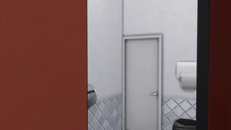 從第二個廁格出來能看見門口。