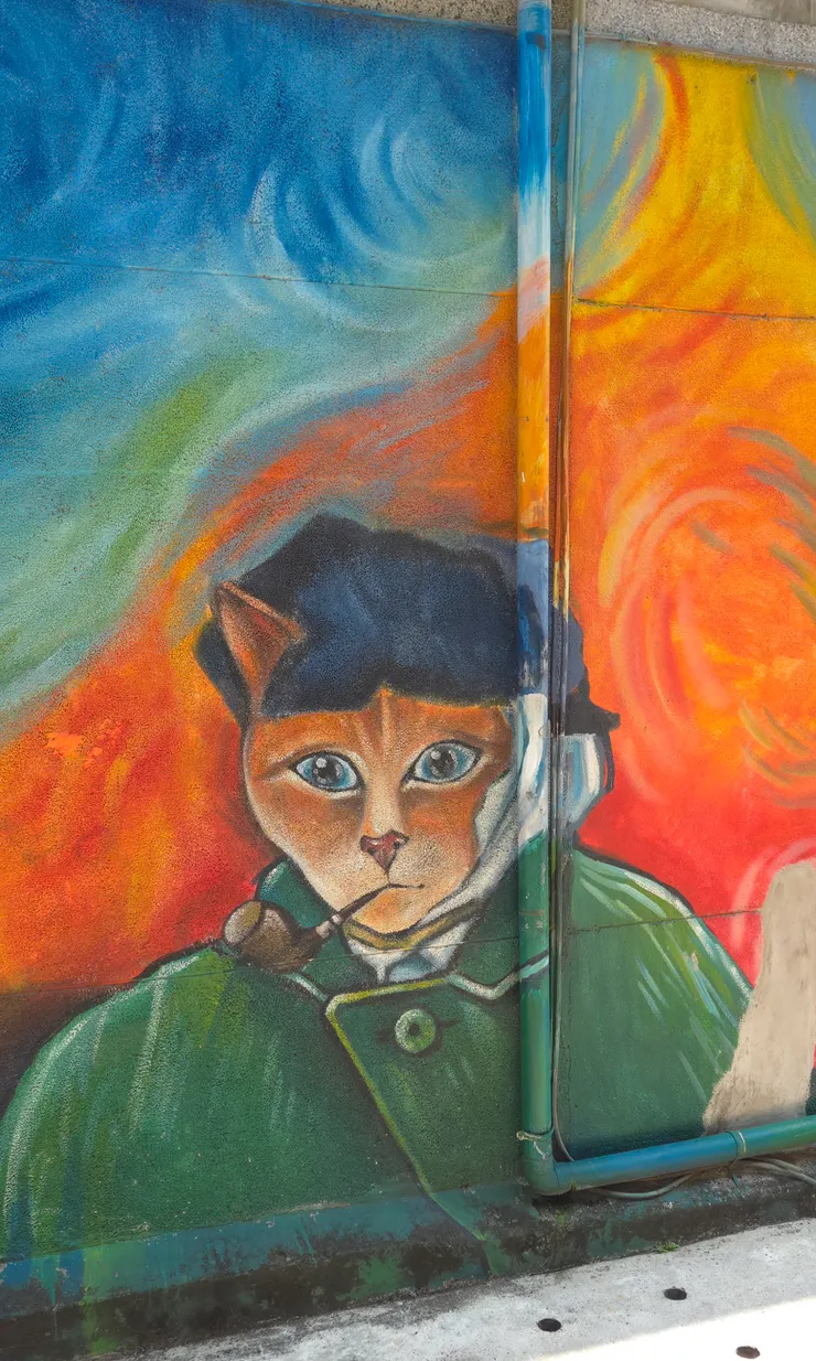 梵谷自畫像，梵谷若是地下有知，看到自己憂鬱的化身變成一隻咬著菸斗的貓，大概會笑到再割下另一隻耳朵。