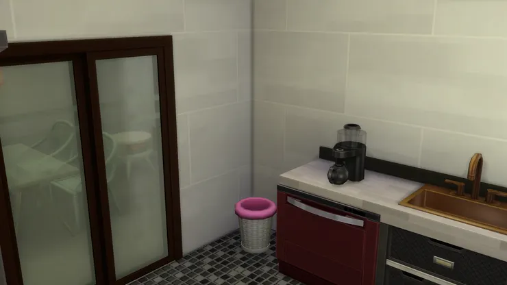 廚房在洗手間旁邊,也對著飯廳。