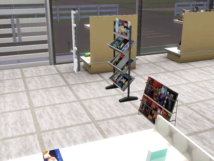 一進來也有雜誌架，吸引客人。