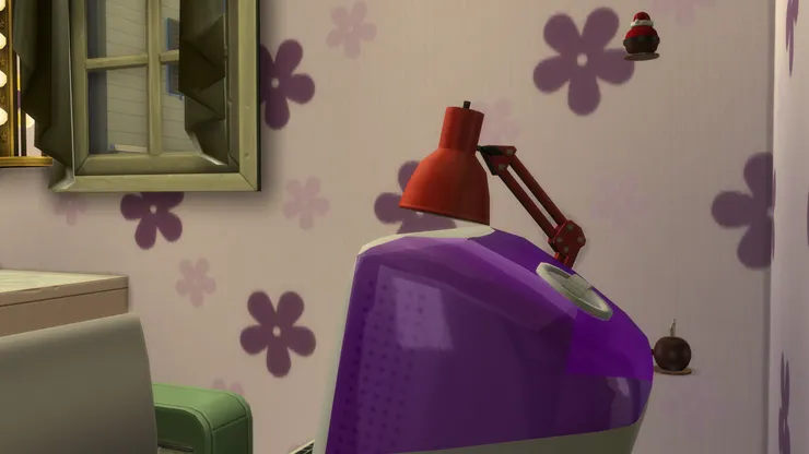 這台電腦讓這房間看起來很有少女感,青春活潑又新潮。