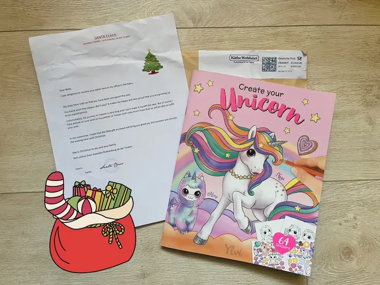 德國聖誕老人的回信，名字和國家都有調整內容，送了一本獨角獸的貼紙著色本，超驚喜的！