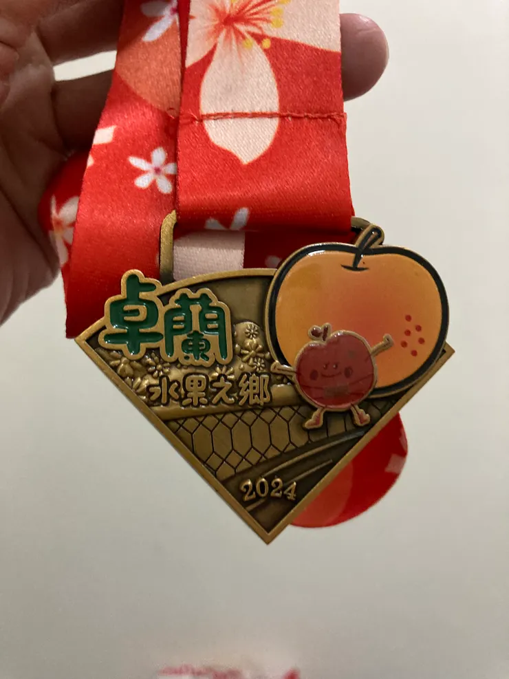 完賽獎牌，連跑4屆是可以拼起來的哦！