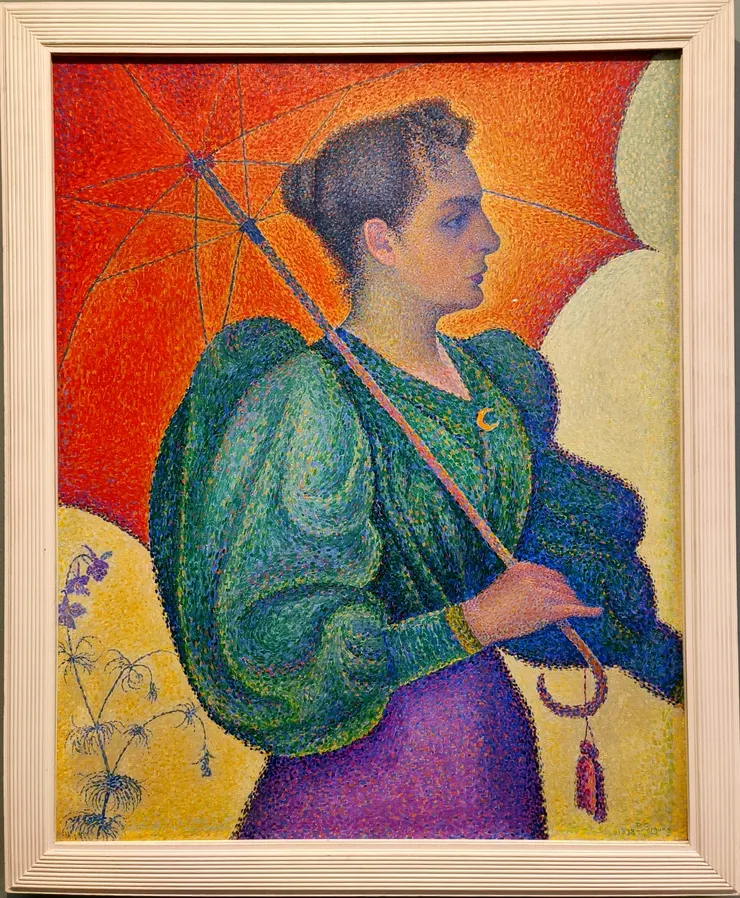 【保羅·席涅克（Paul Signac）於1898 年創作的畫作《持傘的女人》（Woman with Umbrella）。也是點彩畫法。】