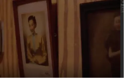 圖1&nbsp;鏡頭經過掛在牆上的女性圖像。