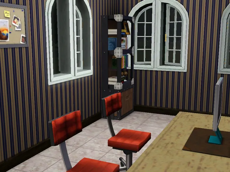 房內一角放了參考書。設計調子較成熟。選這裏也因為這間有兩邊窗戶,環境較好。