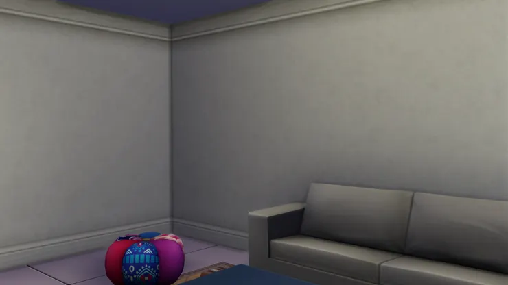 但是我想房間有點活潑的感覺，所以放了花朵懶人坐墊。我很喜歡它彩色跟牆身灰色的對比。