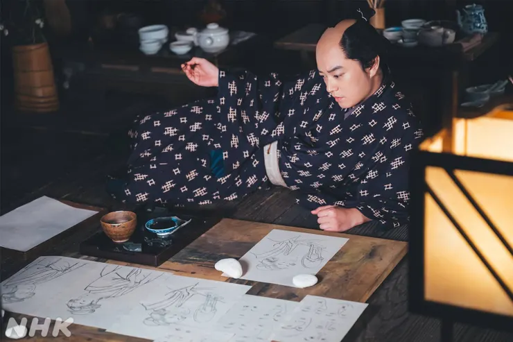 認真作畫的歌麿