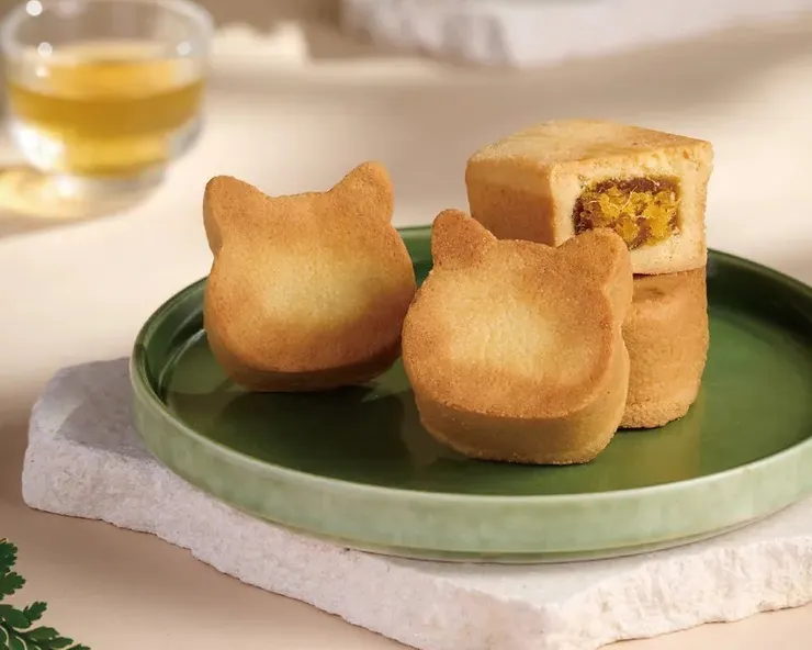 圖說：旺萊貓造型鳳梨酥不只外型萌翻天，更承載台灣重要歷史意義，成功擄獲眾多日本消費者的心。（資料來源：旺萊山）