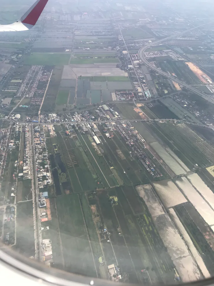起飛後看到腳下的土地。這裏是新機場那邊的方。