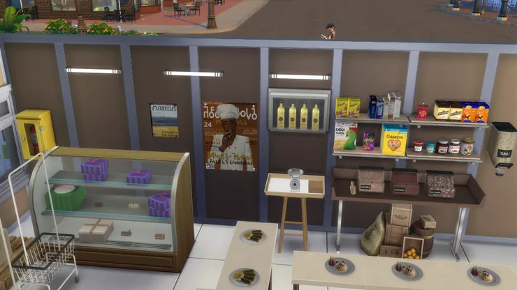 本來這面牆前也放了麵包桌，我的特價麵包便從這裏拿，但我現在改成了早餐食品區了。