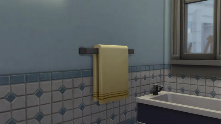 毛巾我特意選了黃色，跟啡色有關連，但不是冷色。