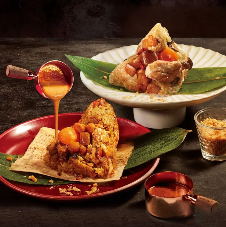 ▲集團推出兩款人氣鹹粽，包含「醇厚麻油雞肉粽」（圖上）及「泰式蝦醬肉粽」（圖下）。