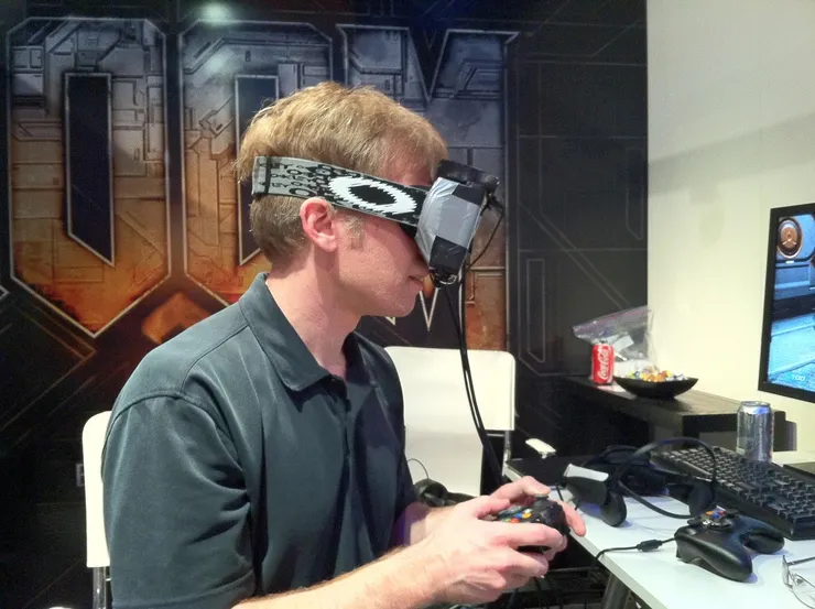 At E3 conference in June 2012, John Carmack showed off his duct-taped prototype of Palmer Luckey’s VR headset.