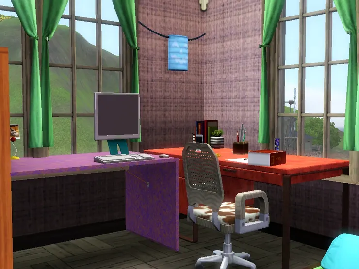 我特意把這兩張桌子擺成L形，一來配合房間這個角落，二來也只要一張電腦椅，需要時一轉身便可以做其他事了，非常方便。