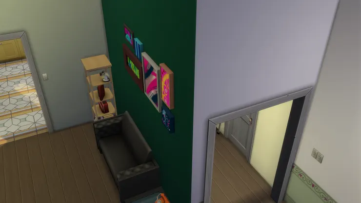 這面L形的牆是我後加的，本來沒有，這樣便分間出玄關和客廳。