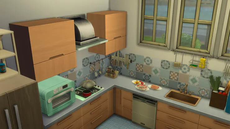 對我來說，廚房相當重要，因為是出產美食的地方！跟廳堂一樣，以灰藍為主色，但調子較淺。