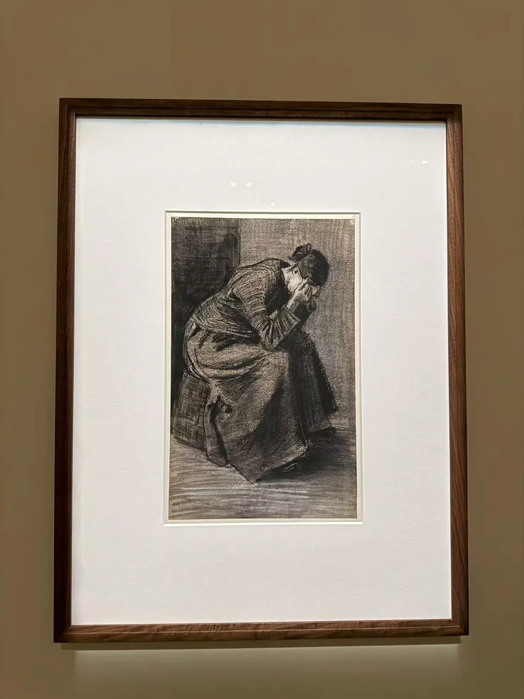 梵谷《坐在籃子上的悲痛的女人》