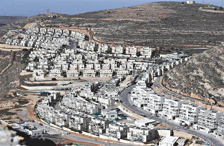 以色列政府長期在巴勒斯坦建立屯墾區,壓迫當地人生存環境,圖為屯墾區一角。(圖源:人間福報)