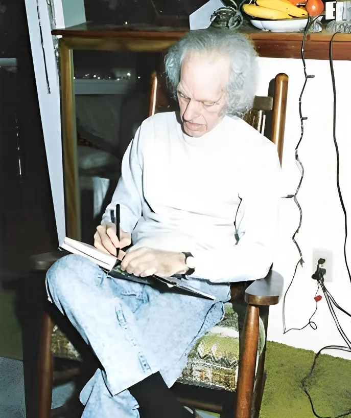 (照片是晚年的Rob 羅)