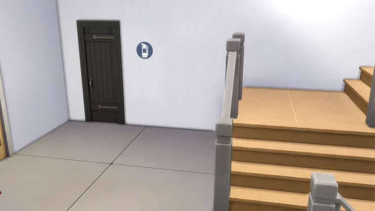 我忘了這條是前梯還是後梯，但這條樓梯旁都有個不起眼的小房間。