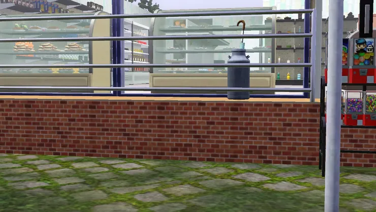 便利店門前的平台上有雨傘桶，下雨時進店前可以把濕的雨傘放在這裏。