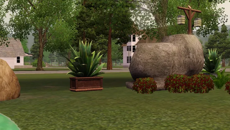 公園有也有綠葉植物和大石頭。