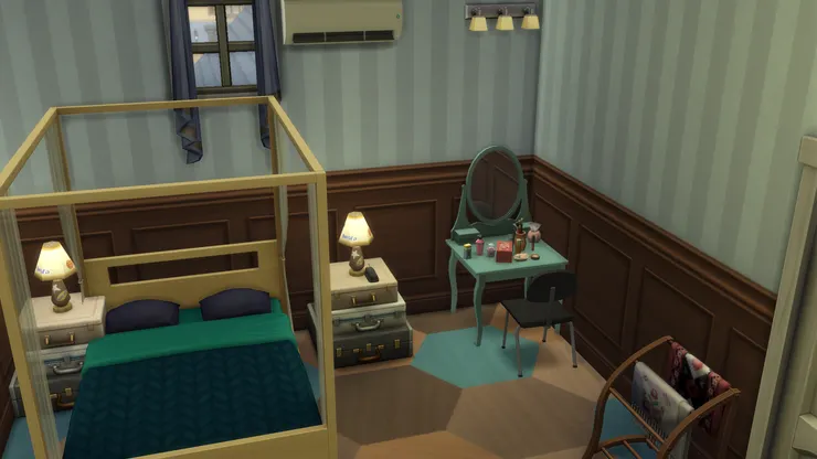 房間以藍和啡為主色，感覺古典。