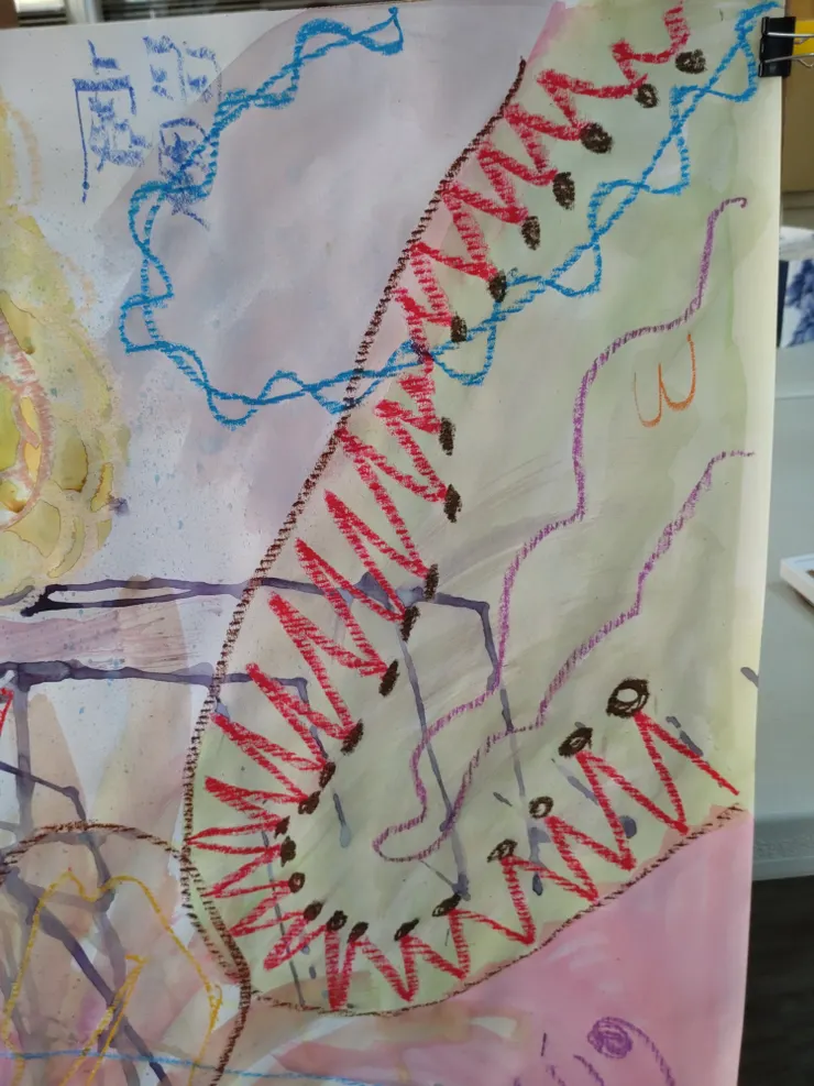 處翼和朋友的簽名部分放大照(朋友的簽名是一個橘色W)