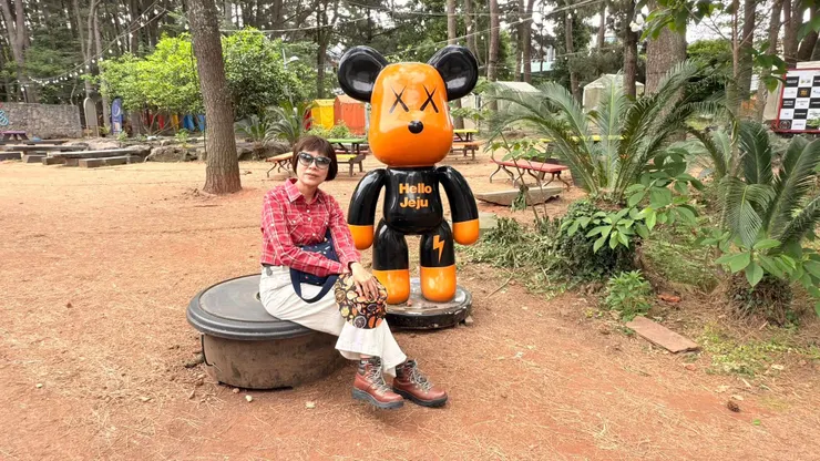 吉祥物顏色和聰嫂的橘子帽一樣