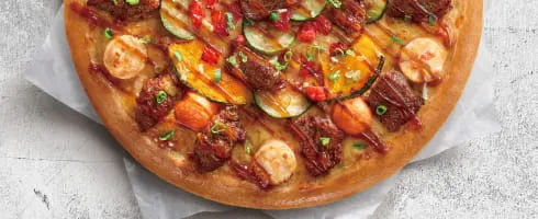 近期必勝客推出的月見菲力披薩