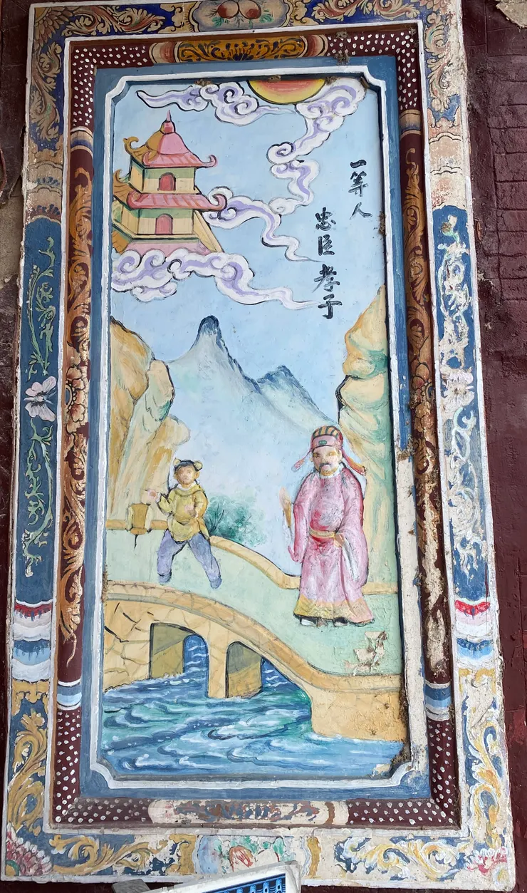 進入祠堂前的壁飾,寫下祖先的教誨