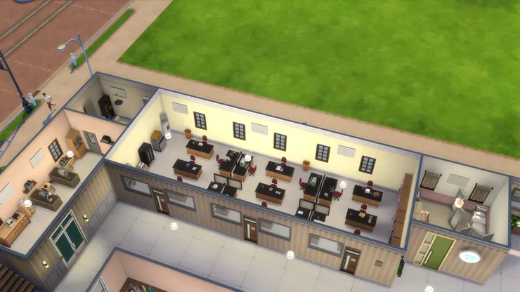 我以前學校的教員室也很大，因為教職員很多。