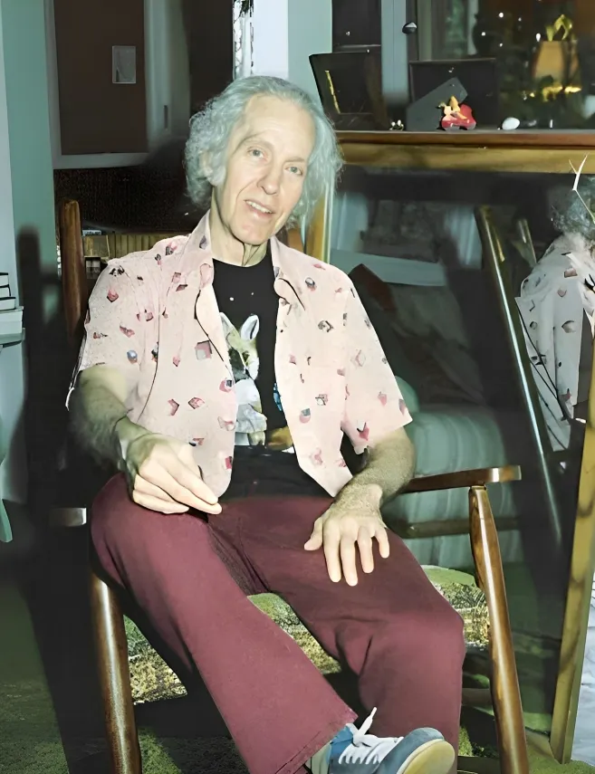 (照片是晚年的Rob 羅)