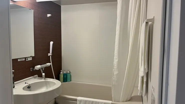 畢竟洗澡可以不用在房間處理。