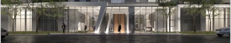 帷幕玻璃的視覺，讓建築與街道呈現出水平大面寬的姿態。實木紋大門，讓清水混凝土更增添了一份溫潤感