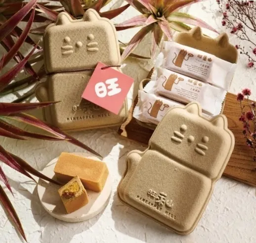圖說:超萌旺萊貓造型禮盒,以鳳梨葉中的天然鳳梨纖維與再生紙漿製作而成,享受美味鳳梨酥同時,也為環境永續盡一份心力。(資料來源:旺萊山)