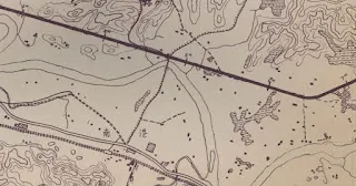 從《麥克阿瑟公路施工報告》所附的平面圖中可以看到輕便軌道與公路立體交叉